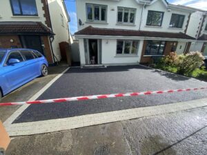 Asphalt driveway with granite cobble border and drainage3