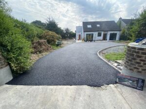 Tarmacadam driveway with kerbing and drainage3