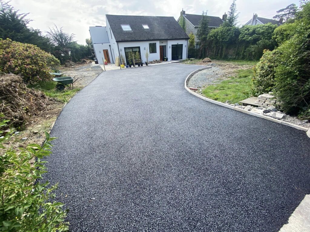 Tarmacadam driveway with kerbing and drainage4