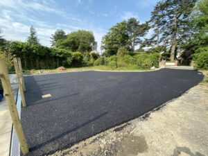 Tarmacadam driveway with kerbing and drainage5