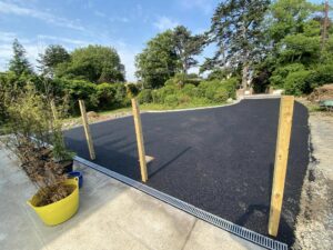 Tarmacadam driveway with kerbing and drainage6