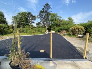 Tarmacadam driveway with kerbing and drainage7