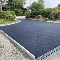 Tarmacadam driveway with kerbing and drainage9